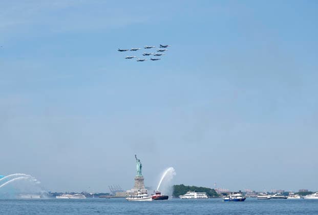 A group of U.S. military jets performs a flyover as part of Sail4th 250, a celebration for America s 250th anniversary, in New York City on Saturday, July 4, 2026. The event includes over 100 tall ships and navy vessels from more than 30 nations.  NYP20260704217 JOHNxANGELILLO