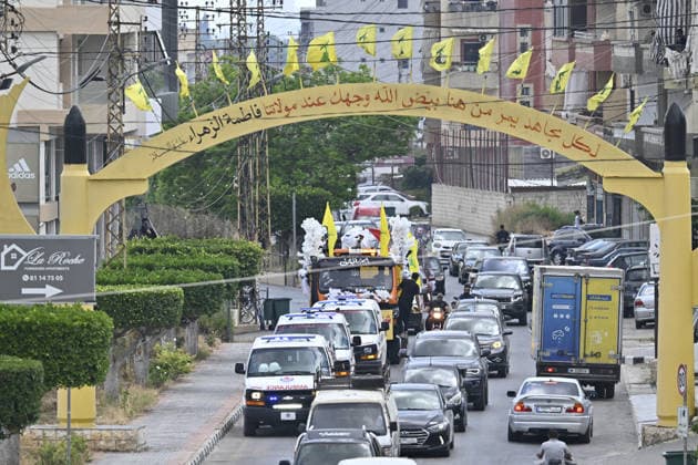 Funeral ceremony for Hezbollah members killed in Israeli attacks TYRE, LEBANON - JULY 4: General view of the funeral ceremony held for Hezbollah members killed during the Israeli attacks in Srifa district of Tyre, in southern Lebanon on July 4, 2026. Hezbollah flags and posters of the deceased were carried at the funeral. Houssam Shbaro Anadolu TYRE Lebanon. Editorial use only. Please get in touch for any other usage.  Copyright: x2026xAnadoluxHoussamxShbarox