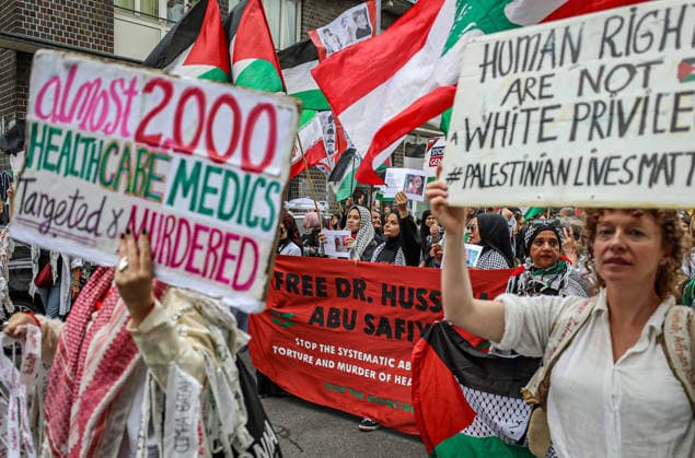 July 4, 2026, Berlin, Berlin, Germany: Berlin, Germany, July 4, 2026: Demonstrators take part in a pro-Palestinian march through central Berlin calling for an end to the war in Gaza, protection of medical workers, and the release of detained Palestinian doctor Hussam Abu Safiya. Participants carried Palestinian flags, banners and photographs during the demonstration. ZUMA Press Wire. Berlin Germany  - ZUMAa268 20260704_zip_a268_005 Copyright: xAbdelrahmanxAlkahloutx