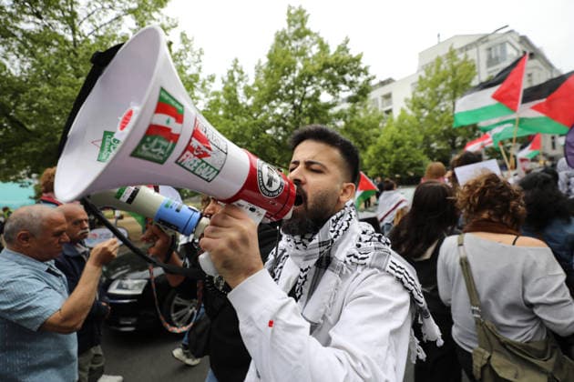 July 4, 2026, Berlin, Berlin, Germany: Berlin, Germany, July 4, 2026: Demonstrators take part in a pro-Palestinian march through central Berlin calling for an end to the war in Gaza, protection of medical workers, and the release of detained Palestinian doctor Hussam Abu Safiya. Participants carried Palestinian flags, banners and photographs during the demonstration. ZUMA Press Wire. Berlin Germany  - ZUMAa268 20260704_zip_a268_009 Copyright: xAbdelrahmanxAlkahloutx