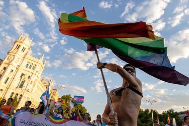 July 4, 2026, Madrid, Madrid, Spain: A man carries a rainbow flag during MADO 2026 on a street in downtown Madrid..Celebration of MADO, annual LGBT Pride parade through the center of Madrid, one of the largest and most important in Europe. Madrid Spain  - ZUMAs197 20260704_aaa_s197_170 Copyright: xSOPAxImagesx
