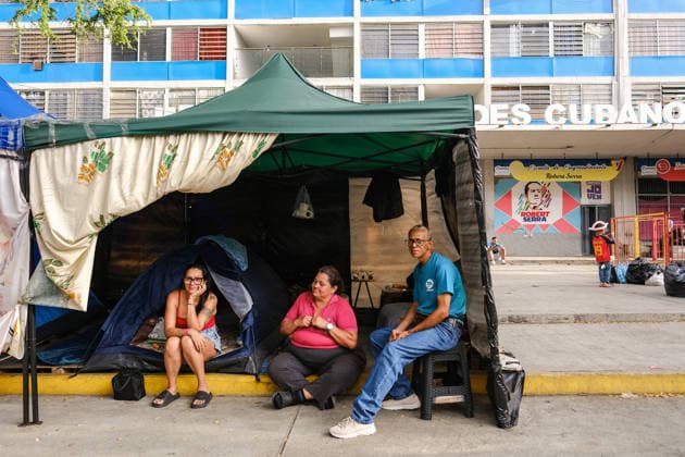 Evacuation of Venezuelan families continue after twin earthquakes CARACAS, VENEZUELA - JULY 4: Displaced Venezuelan families adjust to life inside temporary makeshift camps set up along the central Avenida Bolívar, near local museums, in Caracas, Venezuela, on July 4, 2026. Following the twin earthquakes, residents living in the state-subsidized Mision Vivienda housing complexes were urgently evacuated due to safety concerns. As emergency command continue processing requests for technical inspections, the displaced citizens await engineering assessments to determine whether their apartments are structurally sound for a safe return. Diko Betancourt Anadolu Caracas Venezuela. Editorial use only. Please get in touch for any other usage.  Copyright: x2026xAnadoluxDikoxBetancourtx