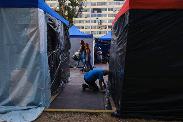 Evacuation of Venezuelan families continue after twin earthquakes CARACAS, VENEZUELA - JULY 4: Displaced Venezuelan families adjust to life inside temporary makeshift camps set up along the central Avenida Bolívar, near local museums, in Caracas, Venezuela, on July 4, 2026. Following the twin earthquakes, residents living in the state-subsidized Mision Vivienda housing complexes were urgently evacuated due to safety concerns. As emergency command continue processing requests for technical inspections, the displaced citizens await engineering assessments to determine whether their apartments are structurally sound for a safe return. Diko Betancourt Anadolu Caracas Venezuela. Editorial use only. Please get in touch for any other usage.  Copyright: x2026xAnadoluxDikoxBetancourtx