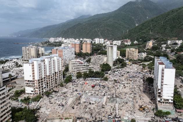 Aerial views reveal scale of devastation in Venezuela after twin earthquakes LA GUAIRA, VENEZUELA - JULY 4: An aerial view captures the catastrophic destruction across the Caraballeda and Caribe neighborhoods in the coastal city of La Guaira, Venezuela, on July 4, 2026, the area hardest hit by the recent 7.2 and 7.5 magnitude twin earthquakes. As emergency response teams continue searching the debris for survivors, the aerial footage underscores the severe impact of the disaster. Cem Tekkesinoglu Anadolu La Guaira Venezuela. Editorial use only. Please get in touch for any other usage.  Copyright: x2026xAnadoluxCemxTekkesinoglux