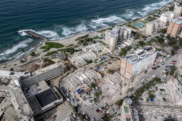 Aerial views reveal scale of devastation in Venezuela after twin earthquakes LA GUAIRA, VENEZUELA - JULY 4: An aerial view captures the catastrophic destruction across the Caraballeda and Caribe neighborhoods in the coastal city of La Guaira, Venezuela, on July 4, 2026, the area hardest hit by the recent 7.2 and 7.5 magnitude twin earthquakes. As emergency response teams continue searching the debris for survivors, the aerial footage underscores the severe impact of the disaster. Cem Tekkesinoglu Anadolu La Guaira Venezuela. Editorial use only. Please get in touch for any other usage.  Copyright: x2026xAnadoluxCemxTekkesinoglux