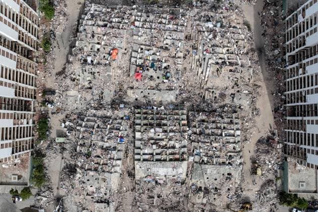 Aerial views reveal scale of devastation in Venezuela after twin earthquakes LA GUAIRA, VENEZUELA - JULY 4: An aerial view captures the catastrophic destruction across the Caraballeda and Caribe neighborhoods in the coastal city of La Guaira, Venezuela, on July 4, 2026, the area hardest hit by the recent 7.2 and 7.5 magnitude twin earthquakes. As emergency response teams continue searching the debris for survivors, the aerial footage underscores the severe impact of the disaster. Cem Tekkesinoglu Anadolu La Guaira Venezuela. Editorial use only. Please get in touch for any other usage.  Copyright: x2026xAnadoluxCemxTekkesinoglux