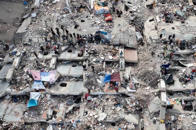 Aerial views reveal scale of devastation in Venezuela after twin earthquakes LA GUAIRA, VENEZUELA - JULY 4: An aerial view captures the catastrophic destruction across the Caraballeda and Caribe neighborhoods in the coastal city of La Guaira, Venezuela, on July 4, 2026, the area hardest hit by the recent 7.2 and 7.5 magnitude twin earthquakes. As emergency response teams continue searching the debris for survivors, the aerial footage underscores the severe impact of the disaster. Cem Tekkesinoglu Anadolu La Guaira Venezuela. Editorial use only. Please get in touch for any other usage.  Copyright: x2026xAnadoluxCemxTekkesinoglux