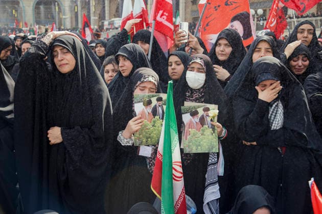 Tehran Iran Khamenei Funeral July 4 Mourners react while holding portraits of Iran s late Supreme Leader Ayatollah Ali Khamenei and current Supreme Leader Ayatollah Mojtaba Khamenei during a funeral ceremony at the Imam Khomeini Grand Mosalla in Tehran, Iran, on July 4, 2026. Ayatollah Khamenei and members of his family were killed on February 28 in a U.S.-Israeli airstrike during the first day of a military campaign against the Islamic Republic. The attack brought an end to his 36-year rule, leading to a six-day multi-city state funeral and drawing thousands of mourners to pay their final respects. Tehran Tehran Iran Copyright: xHosseinxBerisx