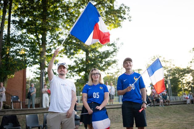 Marine Le Pen and Jordan Bardella at the RN party event La fete champetre - Lievin AJ This photo is an illustration of a participant holds French flags during a RN party event La fete champetre in Lievin, northern France on July 4, 2026. Photo by Alexis Jumeau ABACAPRESS.COM. Paris France  Copyright: xJumeauxAlexis ABACAx