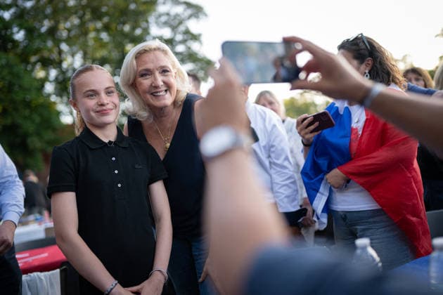 Marine Le Pen and Jordan Bardella at the RN party event La fete champetre - Lievin AJ Rassemblement National s MEP candidate for mayor of Lille, Matthieu Valet and President of Rassemblement National parliamentary group Marine Le Pen reacts and takes selfies with supporters (supporter) during a RN party event La fete champetre in Lievin, northern France on July 4, 2026. Photo by Alexis Jumeau ABACAPRESS.COM. Paris France  Copyright: xJumeauxAlexis ABACAx