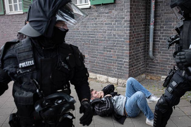 July 4, 2026, Erfurt, Germany: A journalist from Apollo News lies on the ground after being attacked during a protest against the federal party conference of the Alternative for Germany (AfD). The party™s two-day convention is being held at the Erfurt Exhibition Centre on July 4 5. According to police, around 31,000 people took part in the protests, while organizers estimated attendance at about 50,000. Demonstrators held marches, rallies and blockades of several access roads, including a section of the A71 motorway. Erfurt Germany  - ZUMAs197 20260704_aaa_s197_260 Copyright: xVasilyxKrestyaninovx