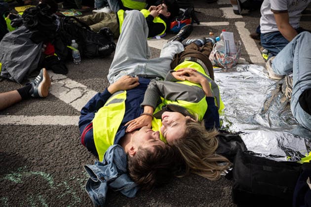 July 4, 2026, Erfurt, Germany: Protesters lie on the road and embrace each other during the demonstration against the federal party conference of the Alternative for Germany (AfD). The party™s two-day convention is being held at the Erfurt Exhibition Centre on July 4 5. According to police, around 31,000 people took part in the protests, while organizers estimated attendance at about 50,000. Demonstrators held marches, rallies and blockades of several access roads, including a section of the A71 motorway. Erfurt Germany - ZUMAs197 20260704_aaa_s197_254 Copyright: xVasilyxKrestyaninovx