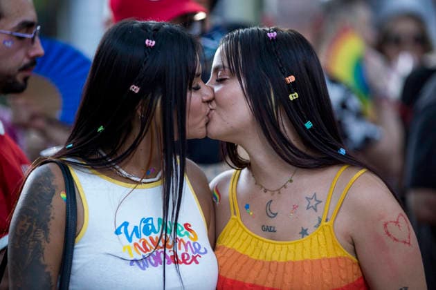 July 4, 2026, Madrid, Spain: A couple of attendees kiss during the 2026 LGBTI+ Pride March, under the slogan Take to the streets with pride! Dissent and resistance, along the Paseo del Prado in Madrid. Madrid Spain  - ZUMAs197 20260704_aaa_s197_282 Copyright: xLuisxSotox