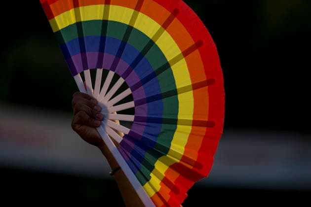 July 4, 2026, Madrid, Spain: An attendee holds a fan with the LGBTQ+ flag during the 2026 LGBTI+ Pride March, under the slogan Take to the streets with pride! Dissent and resistance, along the Paseo del Prado in Madrid. Madrid Spain - ZUMAs197 20260704_aaa_s197_276 Copyright: xLuisxSotox