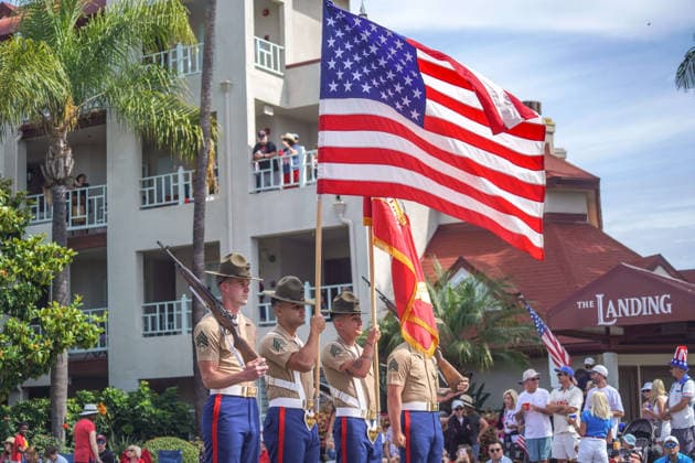 July 4, 2026, Coronado, California, United States: U.S. Marine Corps march with the flags during the parade. Spectators line Orange Avenue as participants march through the annual Independence Day Parade in Coronado on July 4, 2026. The parade, featuring marching bands, military units, community organizations, and decorated vehicles, was part of the city s Independence Day celebrations marking America s 250th birthday and drew thousands of residents and visitors to the coastal community of San Diego area. Coronado United States  - ZUMAs197 20260704_aaa_s197_363 Copyright: xMichaelxHoxWaixLeex