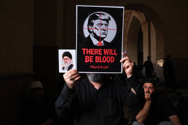 An Iranian attendant holds a banner picturing US President Donald Trump and a portrait of late Iranian supreme leader Ayatollah Ali Khamenei during a mass prayer at the grand Mosallah mosque in Tehran, Iran, 05 July 2026. Iran is set to hold a multi-day state funeral from 04 to 09 July 2026 for the Iranian supreme leader assassinated on 28 February. State funeral of Ayatollah Ali Khamenei !ACHTUNG: NUR REDAKTIONELLE NUTZUNG!  Copyright: xJaimexLeonx GRAF1353 20260705-55020804317_1