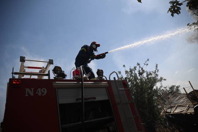 Wildfire continues near Thessaloniki as firefighters battle blaze THESSALONIKI, GREECE - JULY 5: Firefighters battle a wildfire that erupted the previous day in Oreokastro, on the outskirts of Thessaloniki, Greece on July 5, 2026. Svarnias Vasilis Anadolu Thessaloniki Greece. Editorial use only. Please get in touch for any other usage.  Copyright: x2026xAnadoluxSvarniasxVasilisx