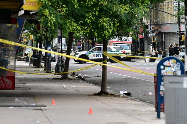 NYPD investigates shooting of officer in Brooklyn NEW YORK, UNITED STATES - JULY 5: Members of the NYPD crime scene unit process the scene where an NYPD officer was shot in the vest in the area of Nostrand Avenue and St. John’s Place in Brooklyn, New York, United States on July 5, 2026. Investigators with the NYPD Crime Scene Unit, detectives and the Force Investigation Division are staged in the area processing the scene. Ballistic damage to an unmarked NYPD vehicle that officers were sitting in was seen at the scene which had bullet holes in the front and rear windshield and the passenger side of the car. Numerous evidence markers were seen scattered at the crime scene. Kyle Mazza Anadolu New York United States. Editorial use only. Plea  Copyright: x2026xAnadoluxKylexMazzax