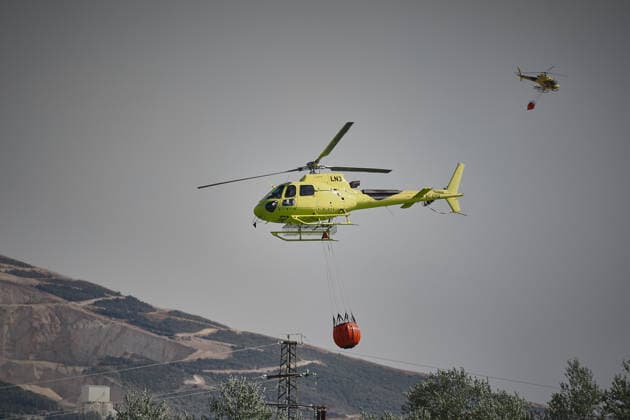 A large wildfire has been reported in Imárcoain, Navarre. Water-bombing helicopters are working to extinguish the wildfire in Imárcoain on July 5, 2026, in Imárcoain, Elorz Valley, Navarre, Spain. Firefighters are currently working to extinguish a fire in a grain field that has spread to a wooded area in Imárcoain, which belongs to the municipality of Elorz Valley. Emergency services received the alert at 4:49 p.m., and a response team consisting of firefighters, aircraft, environmental forest rangers, Local Police, and Regional Police. As a result, the AP 15 has been closed in both directions as a precaution. JULY 5, 2026 Imarcoain, Elorz Valley, Navarre Imarcoain, Elorz Valley, Navarre, Spain  Copyright: xEduardoxSanzx 7647219