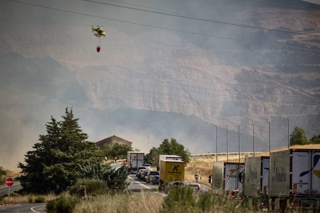 A large wildfire has been reported in Imárcoain, Navarre. Water-bombing helicopters are working to extinguish the wildfire in Imárcoain on July 5, 2026, in Imárcoain, Elorz Valley, Navarre, Spain. Firefighters are currently working to extinguish a fire in a grain field that has spread to a wooded area in Imárcoain, which belongs to the municipality of Elorz Valley. Emergency services received the alert at 4:49 p.m., and a response team consisting of firefighters, aircraft, environmental forest rangers, Local Police, and Regional Police. As a result, the AP 15 has been closed in both directions as a precaution. JULY 5, 2026 Imarcoain, Elorz Valley, Navarre Imarcoain, Elorz Valley, Navarre, Spain  Copyright: xEduardoxSanzx 7647221