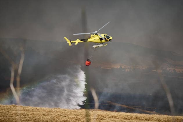 A large wildfire has been reported in Imárcoain, Navarre. Water-bombing helicopters are working to extinguish the wildfire in Imárcoain on July 5, 2026, in Imárcoain, Elorz Valley, Navarre, Spain. Firefighters are currently working to extinguish a fire in a grain field that has spread to a wooded area in Imárcoain, which belongs to the municipality of Elorz Valley. Emergency services received the alert at 4:49 p.m., and a response team consisting of firefighters, aircraft, environmental forest rangers, Local Police, and Regional Police. As a result, the AP 15 has been closed in both directions as a precaution. JULY 5, 2026 Imarcoain, Elorz Valley, Navarre Imarcoain, Elorz Valley, Navarre, Spain  Copyright: xEduardoxSanzx 7647223