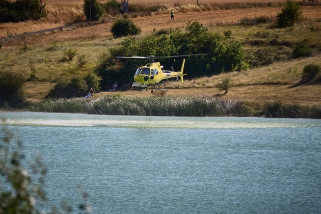 A large wildfire has been reported in Imárcoain, Navarre. Water-bombing helicopters are working to extinguish the wildfire in Imárcoain on July 5, 2026, in Imárcoain, Elorz Valley, Navarre, Spain. Firefighters are currently working to extinguish a fire in a grain field that has spread to a wooded area in Imárcoain, which belongs to the municipality of Elorz Valley. Emergency services received the alert at 4:49 p.m., and a response team consisting of firefighters, aircraft, environmental forest rangers, Local Police, and Regional Police. As a result, the AP 15 has been closed in both directions as a precaution. JULY 5, 2026 Imarcoain, Elorz Valley, Navarre Imarcoain, Elorz Valley, Navarre, Spain  Copyright: xEduardoxSanzx 7647227