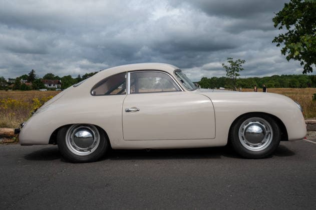 July 5, 2026, London, United Kingdom: A classic 1950s Porsche 356 parked on the road of a London suburb. The Southside Hustle Car Meet is held on Wimbledon Common in Southwest London every first Sunday of the month. This free community event attracts owners of classic cars, supercars, sports cars, and rare or modified vehicles. Car enthusiasts, photographers, and families gather to admire an impressive variety of cars, meet like-minded people, and enjoy the welcoming atmosphere in the scenic surroundings of Wimbledon Common. London United Kingdom  - ZUMAs197 20260705_aab_s197_002 Copyright: xJamesxWilloughbyx