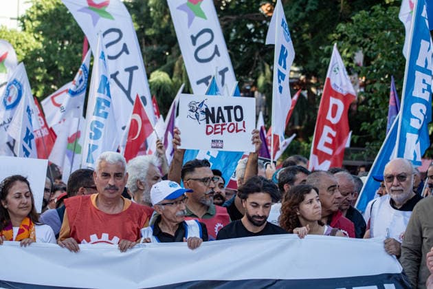 July 5, 2026, Istanbul, Istanbul, Turkey: Members and supporters of the No to NATO Coordination march during a demonstration under the slogan You Are Not Welcome, We Are Marching Against NATO in the Kadikoy district of Istanbul, Turkey, on July 5, 2026. The protest opposed NATO policies, militarization, and war, with participants carrying banners and chanting slogans during the march. Istanbul Turkey  - ZUMAt171 20260705_zip_t171_016 Copyright: xAbdullahxTepelix