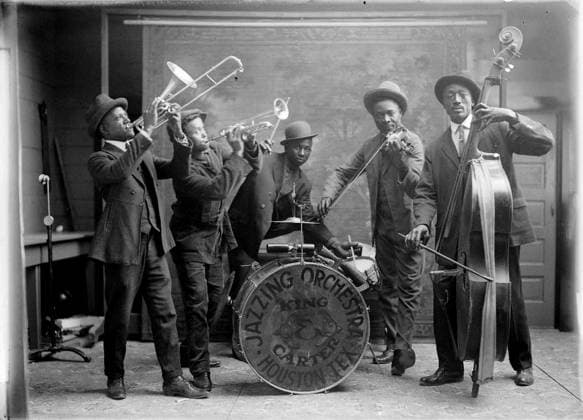 RECORD DATE NOT STATED King & Carter Jazzing Orchestra in Houston in 1921 King & Carter Jazzing Orchestra in Houston in 1921 Editorial Use only. All other uses to be cleared for permission with WHA or representative agent., WHA_197_0465.JPG.jpg, King & Carter Jazzing Orchestra; Houston; 1921; jazz band; African American musicians; vintage; historic; music; performance; group; ensemble; black and white; musicians; 1920s; entertainment; jazz; Texas; United States; African American history; live music; stage; instruments; saxophone; trumpet; drums; double bass; suits; hats; formal attire; classic; retro; American South Copyright: xWorldxHistoryxArchivex