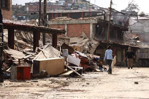 Earthquake Damage Remains Visible in El Junquito as Recovery Continues EL JUNQUITO, CARACAS, VENEZUELA JULY 5, 2026: Destroyed buildings and damaged infrastructure are seen in the El Junquito district of Caracas following the devastating twin earthquakes that struck Venezuela s northern Caribbean region on June 24. Recovery and damage assessment operations continue across affected communities. According to the latest official figures, at least 3,342 people have been killed, more than 16,400 injured, and over 17,000 left homeless as a result of the disaster. EL JUNQUITO Venezuela (Bolivarian Republic of) Copyright: x xLauraxdexChiclanax xJNAxPressx
