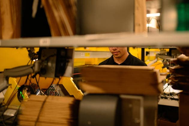 AMAZON PRIME DAY SALE PREVIEW, A worker packs a parcel at the Amazon Fulfilment Centre in Kemps Creek, Sydney, Monday, July 6, 2026. ( NO ARCHIVING SYDNEY NEW SOUTH WALES AUSTRALIA  Copyright: xGEORGExCHANx 20260706147775077378