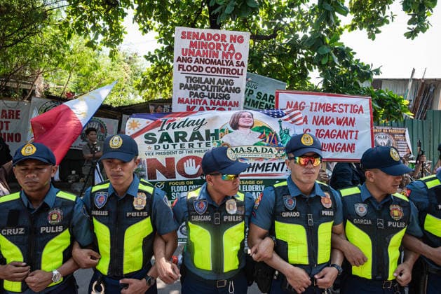July 6, 2026, Quezon City, Quezon, Philippines: Police officers block the supporters of the Vice President from getting near the opposing crowd. Quezon City Philippines  - ZUMAy102 20260706_zip_y102_017 Copyright: xKenosisxYapx