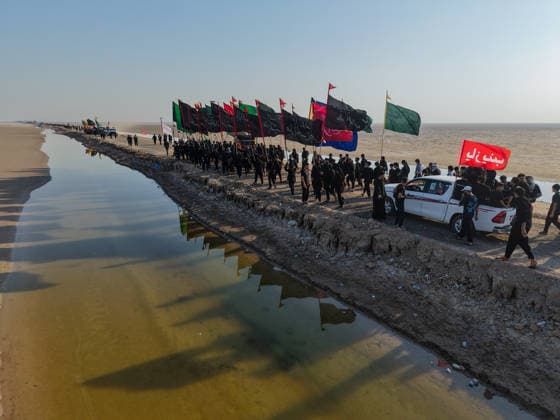 Hundreds walk from Faw to Karbala for Arbaeen commemorations FAW, IRAQ - JULY 06: People from southern Iraq cross the Arabian Gulf in the city of Faw as they walk toward Karbala to attend the Arbaeen commemorations, marking the 40th day after the martyrdom of Imam Hussein, the grandson of Prophet Muhammad, and 72 people accompanying him, in Iraq, on July 06, 2026. Karbala is home to the shrines of Imam Hussein and his brother Abbas. Haidar Mohammed Ali Anadolu Faw Iraq. Editorial use only. Please get in touch for any other usage.  Copyright: x2026xAnadoluxHaidarxMohammedxAlix