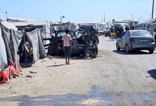 Palestinians inspect the damage caused by an Israeli airstrike on a vehicle near a camp for displaced people in Khan Younis Palestinians inspect the damage caused by an Israeli airstrike on a vehicle near a camp for displaced people in Khan Younis, southern Gaza Strip, on July 6, 2026. According to medical sources, the Israeli airstrike killed one person and injured 15 others. Photo by Tariq Mohammad APA Images Khan Yunis Gaza Strip Palestinian Territory 060726_Khan_Yunis_TM_00(29) Copyright: xapaimagesxTariqxMohammad xapaimagesx