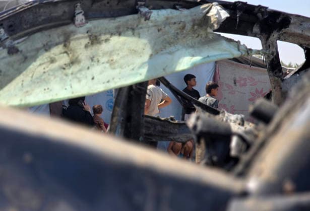 Palestinians inspect the damage caused by an Israeli airstrike on a vehicle near a camp for displaced people in Khan Younis Palestinians inspect the damage caused by an Israeli airstrike on a vehicle near a camp for displaced people in Khan Younis, southern Gaza Strip, on July 6, 2026. According to medical sources, the Israeli airstrike killed one person and injured 15 others. Photo by Tariq Mohammad APA Images Khan Yunis Gaza Strip Palestinian Territory 060726_Khan_Yunis_TM_00(16) Copyright: xapaimagesxTariqxMohammad xapaimagesx
