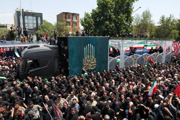 IRAN, TEHRAN - JULY 6, 2026: A truck carries the coffin as mourners follow a funeral procession for Supreme Leader Ayatollah Ali Khamenei (1939-2026) through the city s centre. Khamenei was killed in a joint US-Israeli airstrike on February 28 Tehran Iran  - ZUMAt113 20260706_zaa_t113_100 Copyright: xValeryxSharifulinx