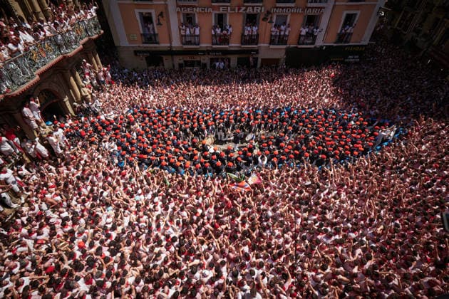 San Fermín 2026 Chupinazo: The bagpipers emerge from inside Pamplona City Hall and head to the Plaza Consistorial after the San Fermín 2026 Chupinazo, held in the Plaza del Ayuntamiento on July 6, 2026, in Pamplona, Navarre, Spain. The Chupinazo marks the official start of the San Fermín festivities, which run through July 14. For this year’s event, the Navarre Emergency Services Division is in charge of lighting the rocket’s fuse, in recognition of its work during the bull runs. Spain  Copyright: xEduardoxSanzx 7648863