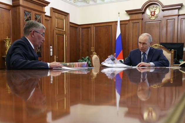RUSSIA, MOSCOW - JULY 6, 2026: Dmitry Milyayev (L), Tula Region Governor, and Vladimir Putin, President of Russia, hold a meeting at the Moscow Kremlin. Gavriil Grigorov Russian Presidential Press and Information Office TASS  94747193