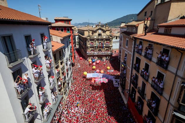 San Fermin Festival in Spain PAMPLONA, SPAIN - JULY 06: People celebrate during the opening of the San Fermin Festival in Pamplona, Spain on July 06, 2026. The festival, one of Spain s best-known cultural events and famous for the running of the bulls through narrow streets, officially began with the traditional Chupinazo, a ceremonial rocket launched from the balcony of the city hall. Ruben Albarran Anadolu Pamplona Spain. Editorial use only. Please get in touch for any other usage.  Copyright: x2026xAnadoluxRubenxAlbarranx