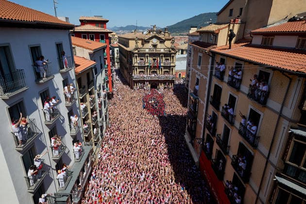 San Fermin Festival in Spain PAMPLONA, SPAIN - JULY 06: People celebrate during the opening of the San Fermin Festival in Pamplona, Spain on July 06, 2026. The festival, one of Spain s best-known cultural events and famous for the running of the bulls through narrow streets, officially began with the traditional Chupinazo, a ceremonial rocket launched from the balcony of the city hall. Ruben Albarran Anadolu Pamplona Spain. Editorial use only. Please get in touch for any other usage.  Copyright: x2026xAnadoluxRubenxAlbarranx
