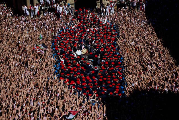 San Fermin Festival in Spain PAMPLONA, SPAIN - JULY 06: People celebrate during the opening of the San Fermin Festival in Pamplona, Spain on July 06, 2026. The festival, one of Spain s best-known cultural events and famous for the running of the bulls through narrow streets, officially began with the traditional Chupinazo, a ceremonial rocket launched from the balcony of the city hall. Ruben Albarran Anadolu Pamplona Spain. Editorial use only. Please get in touch for any other usage.  Copyright: x2026xAnadoluxRubenxAlbarranx