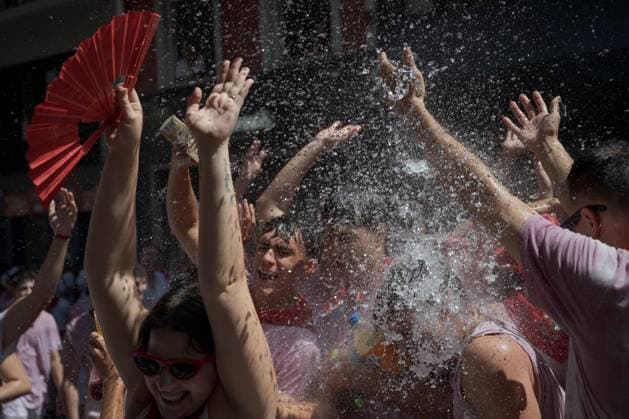 San Fermin festival opens with Chupinazo celebration in Pamplona PAMPLONA, SPAIN - JULY 6: Revellers enjoy the atmosphere during the opening day or Chupinazo of the San Fermin in on July 6, 2026. Every year, thousands of people flock to Pamplona for a week-long festival and its famous running of the bulls. During the running of the bulls, six bulls and six oxen are released each day at 8:00 a.m. to run from the corral to the bullring through narrow streets, a tradition that dates back to the Middle Ages. The week-long festival also features fireworks, religious processions, folkloric dancing, concerts, and drinking. Pamploa Navarre ES Copyright: x xGarixGaraialdex xJNAxPressx