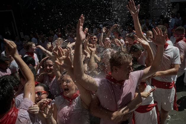 San Fermin festival opens with Chupinazo celebration in Pamplona PAMPLONA, SPAIN - JULY 6: Revellers enjoy the atmosphere during the opening day or Chupinazo of the San Fermin in on July 6, 2026. Every year, thousands of people flock to Pamplona for a week-long festival and its famous running of the bulls. During the running of the bulls, six bulls and six oxen are released each day at 8:00 a.m. to run from the corral to the bullring through narrow streets, a tradition that dates back to the Middle Ages. The week-long festival also features fireworks, religious processions, folkloric dancing, concerts, and drinking. Pamploa Navarre ES Copyright: x xGarixGaraialdex xJNAxPressx