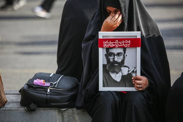 (260706) -- TEHRAN, July 6, 2026 -- A woman mourns in a procession to bid farewell to Iran s late Supreme Leader Ali Khamenei in Tehran, Iran, July 6, 2026. ( Handout via Xinhua) IRAN-TEHRAN-LATE SUPREME LEADER-ALI KHAMENEI-FAREWELL MehrxNewsxAgency 