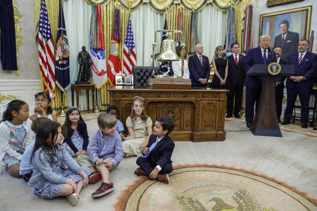 US President Donald J. Trump delivers remarks on Trump Accounts Children sit on the floor as US President Donald J. Trump (R) speaks on the first day of trading for Trump Accounts in the Oval Office of the White House in Washington, DC, USA, 06 July 2026. Trump Accounts grant eligible US children born between 2026 and 2028 $1000.00 to fund ‘starter’ IRAs. WASHINGTON DISTRICT OF COLUMBIA United States  Copyright: xPool ABACAx