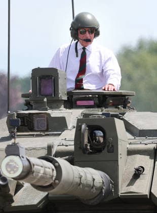 King Charles visits the Royal Tank Regiment s Families Day BOVINGTON, DORSET - JULY 06: King Charles III rides in a Challenger 3 Main Battle Tank during The Royal Tank Regiment s Families Day at the Tank Museum on July 06, 2026 in Bovington, Dorset. (Photo by Chris Jackson Getty Images)King Charles visits the Royal Tank Regiment s Families Day at the Tank Museum, Bovington, Dorset, UK, on the 6th July 2026. Picture by Chris Jackson WPA-Pool Bovington Tank Museum Dorset United Kingdom  WHA-0830
