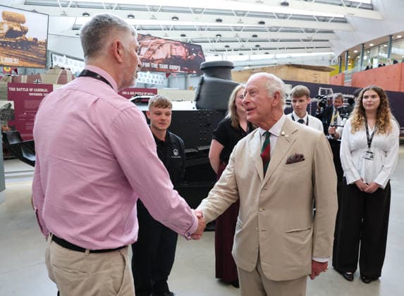 King Charles visits the Royal Tank Regiment s Families Day BOVINGTON, DORSET - JULY 06: King Charles III meets former RTR and museum staff in the exhibition hall during The Royal Tank Regiment s Families Day at the Tank Museum on July 06, 2026 in Bovington, Dorset. (Photo by Chris Jackson Getty Images)King Charles visits the Royal Tank Regiment s Families Day at the Tank Museum, Bovington, Dorset, UK, on the 6th July 2026. Picture by Chris Jackson WPA-Pool Bovington Tank Museum Dorset United Kingdom  WHA-0830