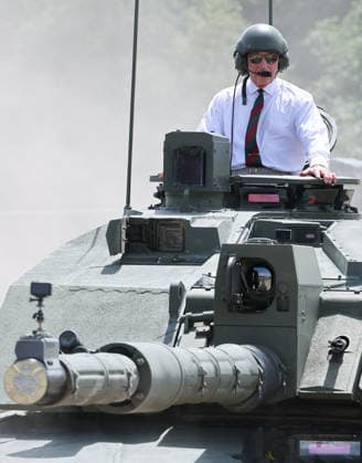King Charles visits the Royal Tank Regiment s Families Day BOVINGTON, DORSET - JULY 06: King Charles III rides in a Challenger 3 Main Battle Tank during The Royal Tank Regiment s Families Day at the Tank Museum on July 06, 2026 in Bovington, Dorset. (Photo by Chris Jackson Getty Images)King Charles visits the Royal Tank Regiment s Families Day at the Tank Museum, Bovington, Dorset, UK, on the 6th July 2026. Picture by Chris Jackson WPA-Pool Bovington Tank Museum Dorset United Kingdom  WHA-0830