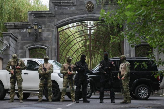 ARMENIA, KOTAYK PROVINCE - JULY 6, 2026: Law enforcement officers guard the area outside the home of Gagik Tsarukyan, Chairman of Prosperous Armenia, in the village of Arinj, northeast of Yerevan. According to his spokeswoman, searches occur across almost all of the offices of companies owned by Tsarukyan s Multi Group Concern. Alexander Patrin TASS  94755367