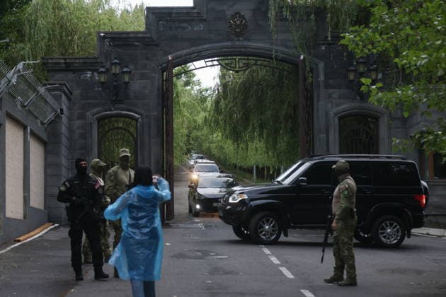 ARMENIA, KOTAYK PROVINCE - JULY 6, 2026: Law enforcement officers guard the area outside the home of Gagik Tsarukyan, Chairman of Prosperous Armenia, in the village of Arinj, northeast of Yerevan. According to his spokeswoman, searches occur across almost all of the offices of companies owned by Tsarukyan s Multi Group Concern. Alexander Patrin TASS  94755369